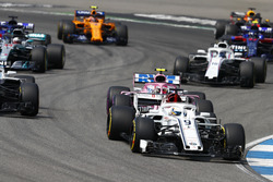 Marcus Ericsson, Sauber C37, leads Esteban Ocon, Force India VJM11, Lewis Hamilton, Mercedes AMG F1 W09, and Lance Stroll, Williams FW41