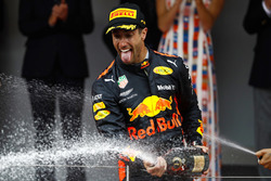 Race winner Daniel Ricciardo, Red Bull Racing, spray champagne on the podium