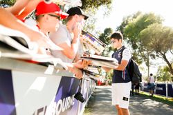 Lance Stroll, Williams Racing, signs an autograph