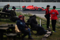 Fans watch Sebastian Vettel, Ferrari SF71H