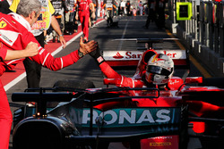 Race winner Sebastian Vettel, Ferrari SF70H celebrates with Maurizio Arrivabene, Ferrari Team Principal in parc ferme