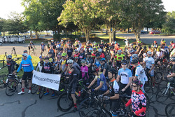 Cyclists gather before a bike ride honoring Nicky Hayden