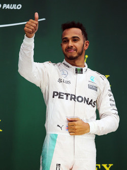Race winner Lewis Hamilton, Mercedes AMG F1 celebrates on the podium