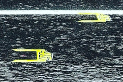 Valentino Rossi marcas pit lane Warm Up con lluvia
