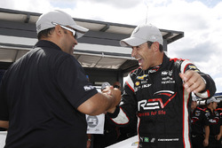 Polesitter Helio Castroneves, Team Penske Chevrolet celebrates his 50th pole position with Steven Williams of Verizon