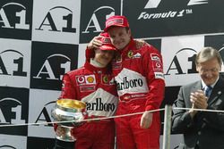 Podium: race winner Michael Schumacher, Ferrari, second place Rubens Barrichello, Ferrari