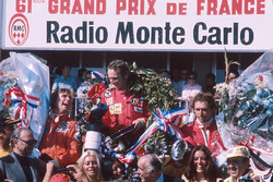 Podium: winner Niki Lauda, Ferrari, second place James Hunt, Hesketh Ford, third place Jochen Mass, McLaren Ford