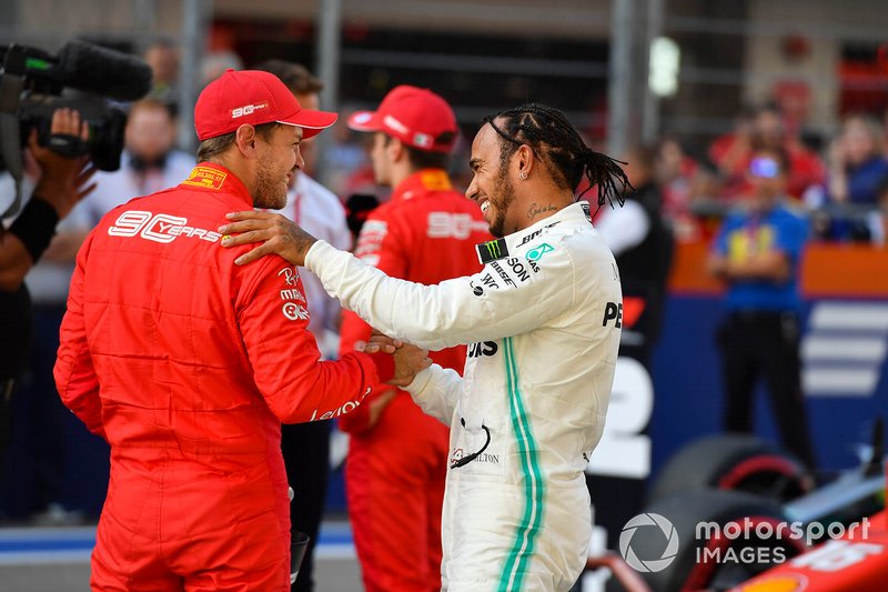 Sebastian Vettel, Ferrari, and Lewis Hamilton, Mercedes AMG F1, congratulate each other after Qualifying