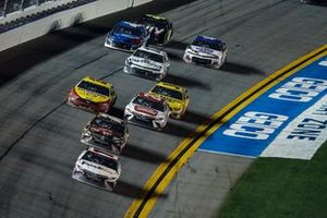 Winner Denny Hamlin, Joe Gibbs Racing, Toyota Camry FedEx Express leads the final few feet before the checkered flag and finish line