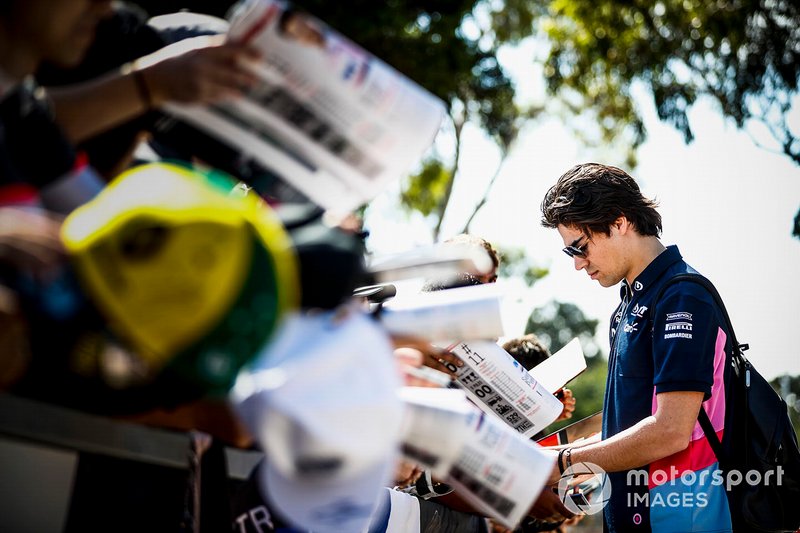 Lance Stroll, Racing Point signs an autograph for a fan