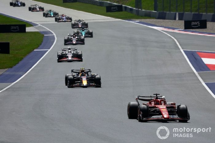 Charles Leclerc, Ferrari SF-24, Sergio Perez, Red Bull Racing RB20, Kevin Magnussen, Haas VF-24