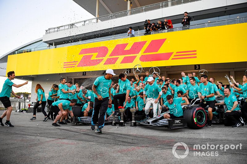 The Mercedes team celebrates victory in the Constructors Championship