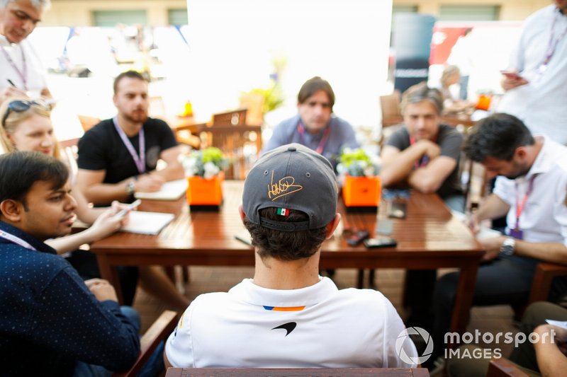 Lando Norris, McLaren, talks to the media