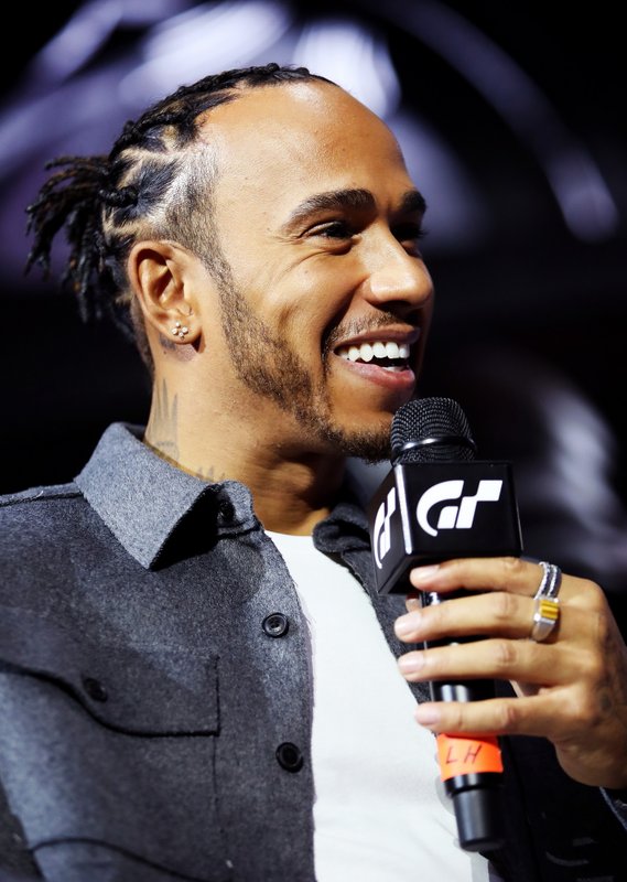 Formula 1 Driver, Lewis Hamilton speaks on stage