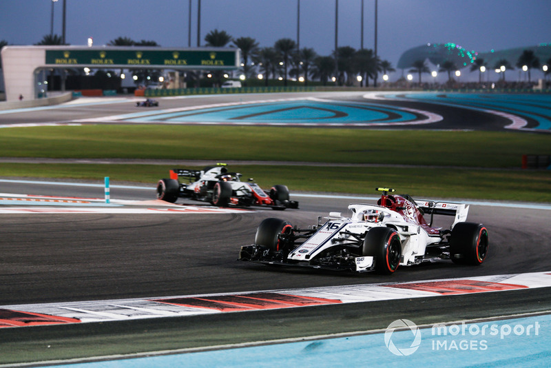 Charles Leclerc, Sauber C37 leads Kevin Magnussen, Haas F1 Team VF-18