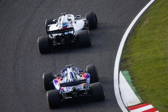 Lance Stroll, Williams FW41, leads Brendon Hartley, Toro Rosso STR13