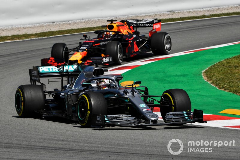 Lewis Hamilton, Mercedes AMG F1 W10, leads Max Verstappen, Red Bull Racing RB15