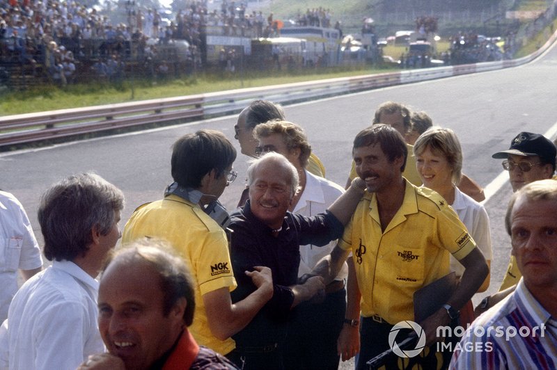 Colin Chapman and the Lotus team mechanics celebrate victory