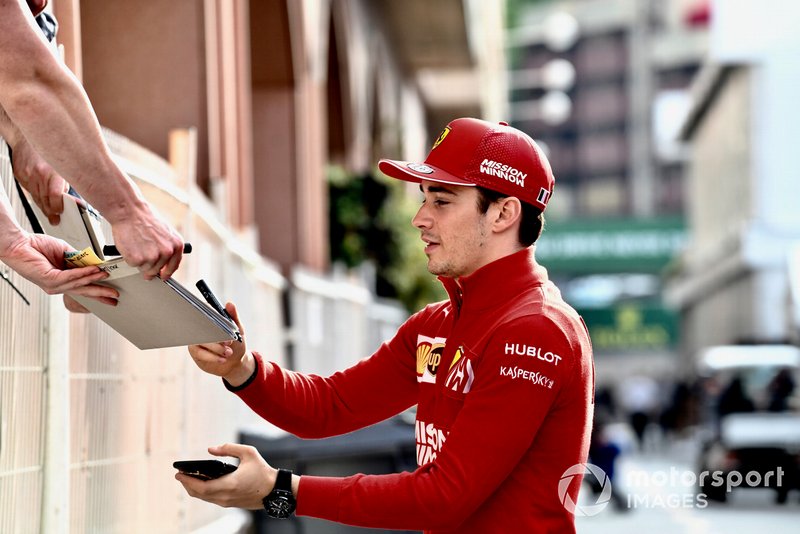 Charles Leclerc, Ferrari signs an autograph for a fan