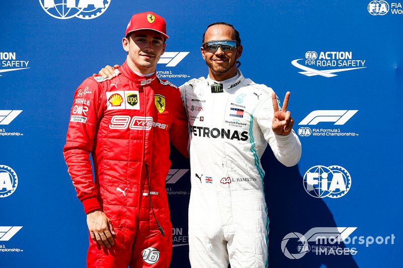 Charles Leclerc, Ferrari and Pole Sitter Lewis Hamilton, Mercedes AMG F1 celebrate in Parc Ferme