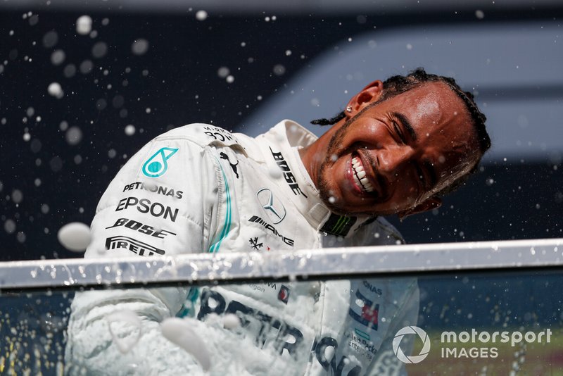 Lewis Hamilton, Mercedes AMG F1 celebrates on the podium with the champagne