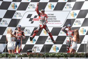 Podio: il secondo classificato Marc Marquez, Repsol Honda Team, il vincitore della gara Jorge Lorenzo, Ducati Team, il terzo classificato Andrea Dovizioso, Ducati Team