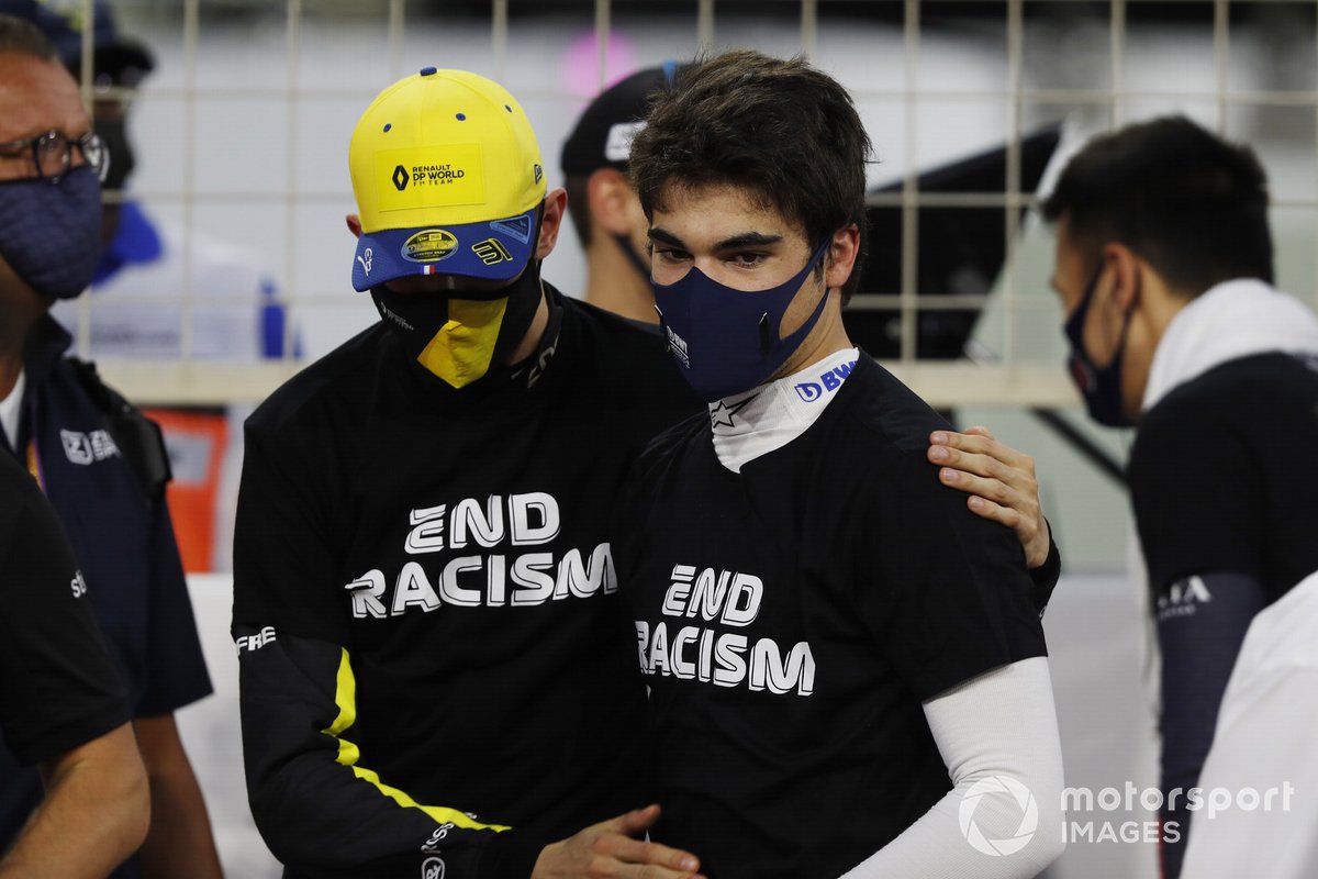 Esteban Ocon, Renault F1, e Lance Stroll, Racing Point, sulla griglia