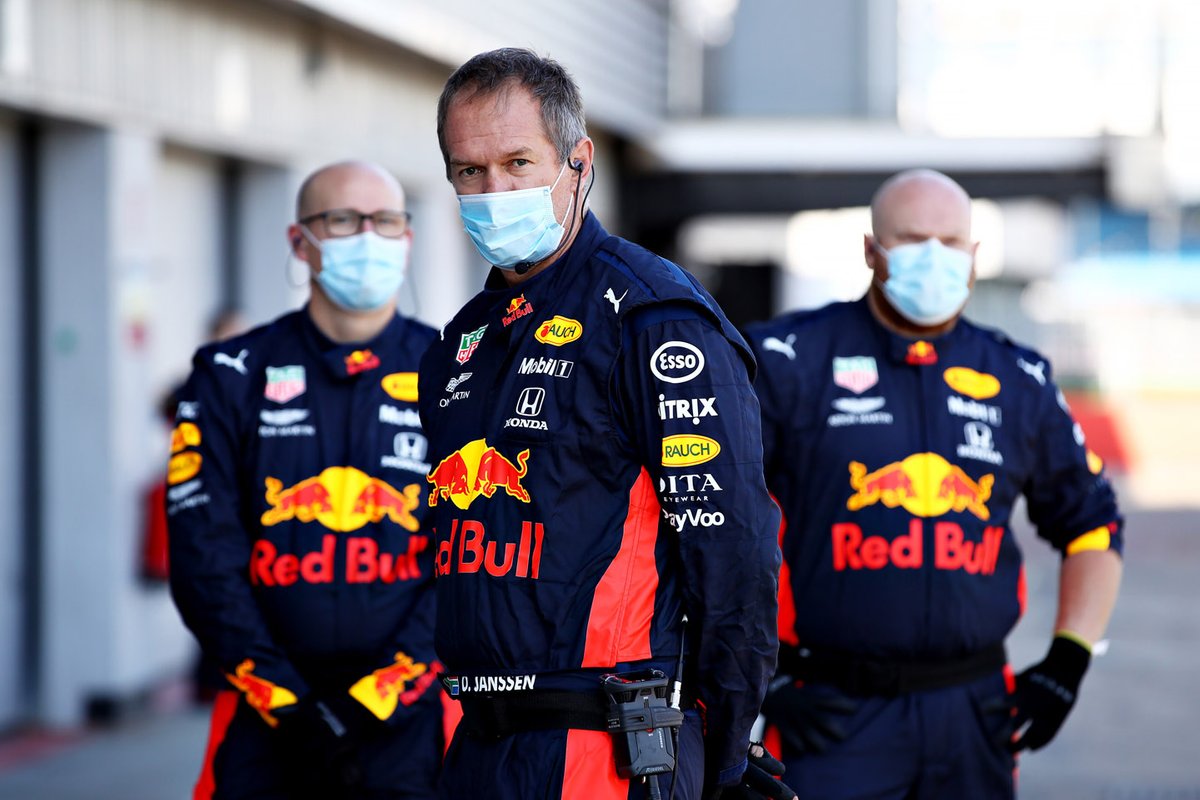 Red Bull Racing team members in the pitlane