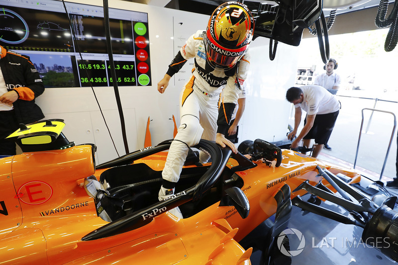 Stoffel Vandoorne, McLaren, enters his cockpit