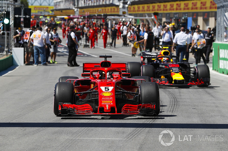 Sebastian Vettel, Ferrari SF71H, celebrates pole position ahead of Max Verstappen, Red Bull Racing