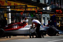 Charles Leclerc, Sauber C37, is returned to the garage