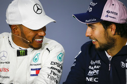 Lewis Hamilton, Mercedes AMG F1, 1st position, and Sergio Perez, Force India, 3rd position, share a joke in the Press Conference