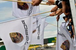 #77 Proton Competition Porsche 911 RSR: Christian Ried, Julien Andlauer, Matt Campbell celebrate the win with Porsche flags