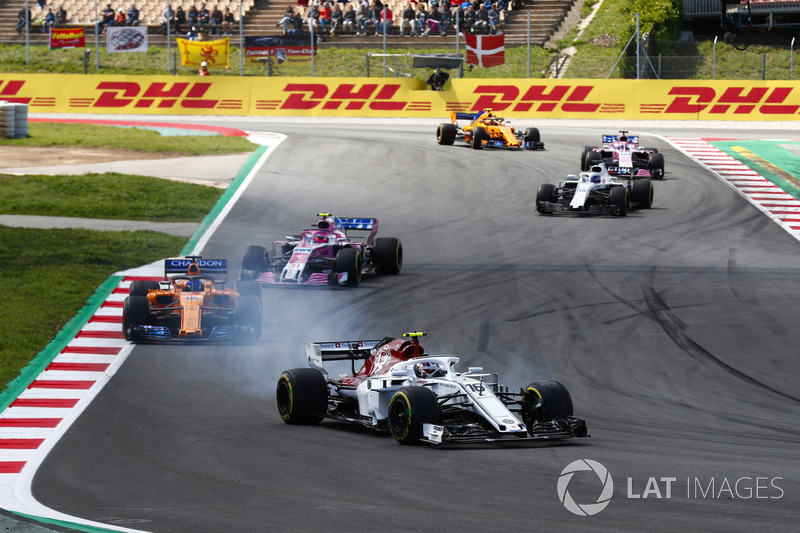 Charles Leclerc, Sauber C37, Fernando Alonso, McLaren MCL33 ed Esteban Ocon, Force India VJM11