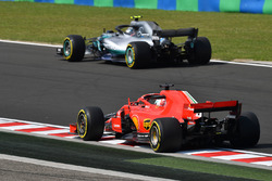 Sebastian Vettel, Ferrari SF71H and Valtteri Bottas, Mercedes-AMG F1 W09