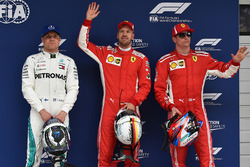 Обладатель поула Себастьян Феттель, второе место – Кими Райкконен, Ferrari, третье место – Валттери Боттас, Mercedes AMG F1