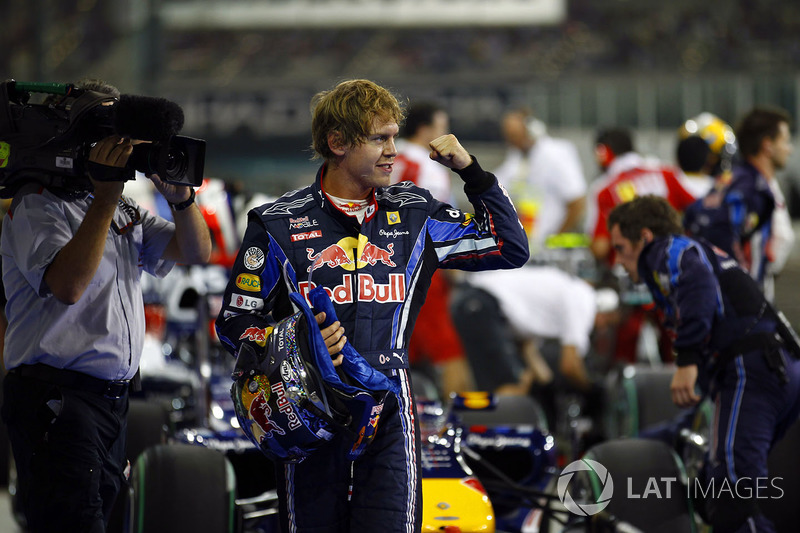 Sebastian Vettel, Red Bull Racing RB6 Renault, celebrates pole in Parc Ferme