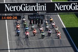 Valentino Rossi, Yamaha Factory Racing, Andrea Iannone, Ducati Team on the front row