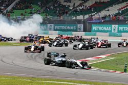 Lewis Hamilton, Mercedes AMG F1 W07 Hybrid leads at the start of the race as team mate Nico Rosberg,