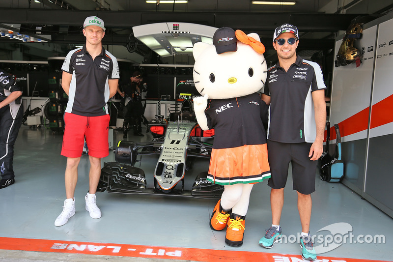 Nico Hulkenberg, Sahara Force India F1 and team mate Sergio Perez, Sahara Force India F1 with Hello 