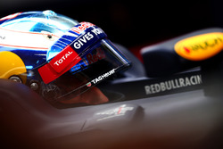 Daniel Ricciardo, Red Bull Racing sits in his car in the garage