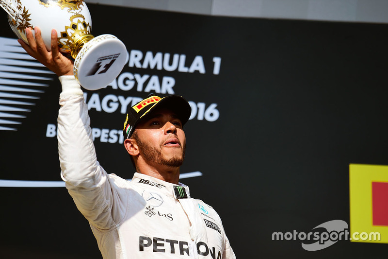 Race winner Lewis Hamilton, Mercedes AMG F1 celebrates on the podium