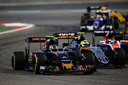 Carlos Sainz Jr., Scuderia Toro Rosso STR11 and Sergio Perez, Sahara Force India F1 VJM09