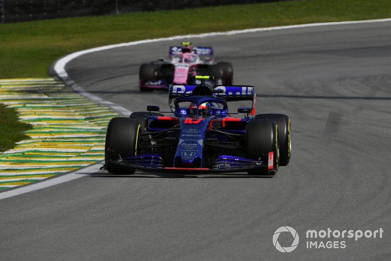 Pierre Gasly, Toro Rosso STR14, leads Lance Stroll, Racing Point RP19