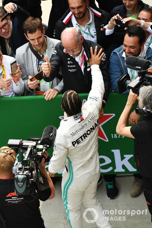 Lewis Hamilton, Mercedes AMG F1, 1st position, celebrates with Dr Dieter Zetsche, CEO, Mercedes Benz, in Parc Ferme
