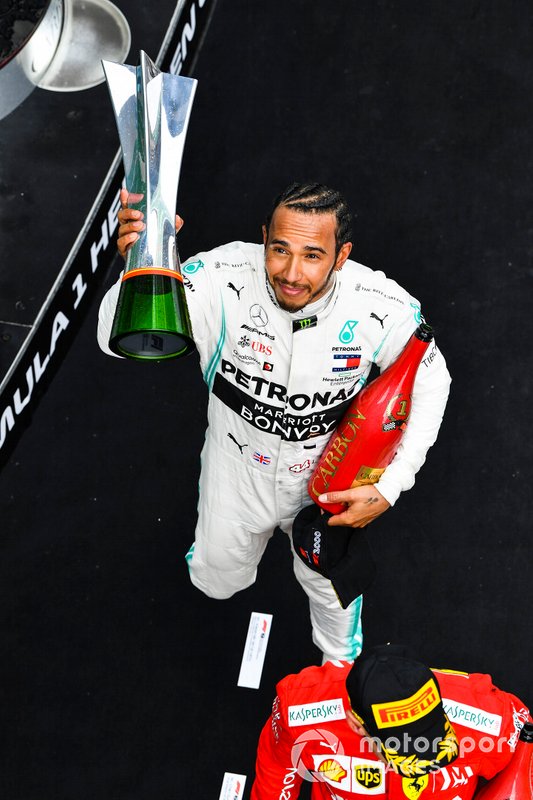 Lewis Hamilton, Mercedes AMG F1, 1st position, with his trophy and Champagne
