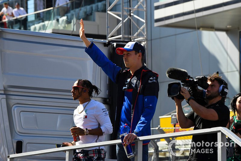 Lewis Hamilton, Mercedes AMG F1, and Daniil Kvyat, Toro Rosso, in the drivers parade