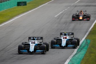 George Russell, Williams Racing FW42, leads Robert Kubica, Williams FW42, and Max Verstappen, Red Bull Racing RB15