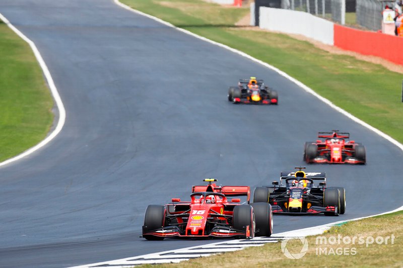 Charles Leclerc, Ferrari SF90, leads Max Verstappen, Red Bull Racing RB15, Sebastian Vettel, Ferrari SF90, and Pierre Gasly, Red Bull Racing RB15