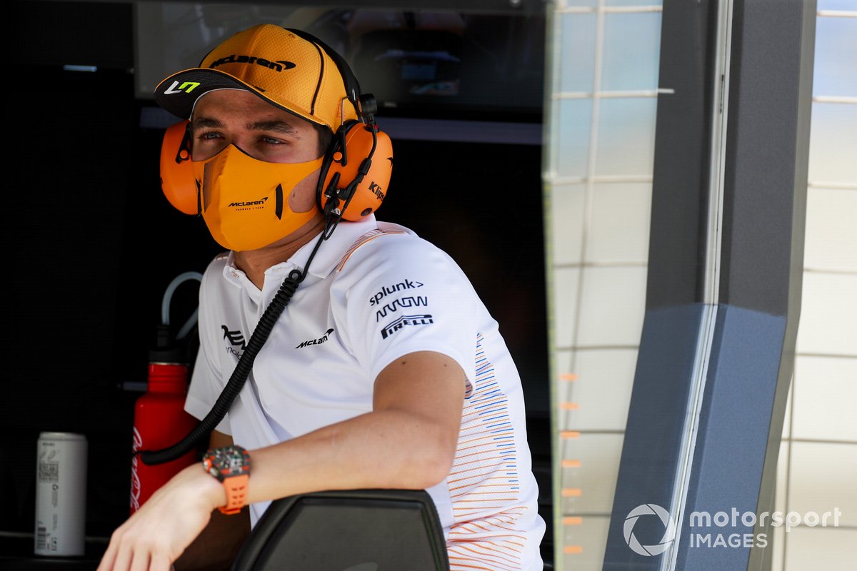 Lando Norris, McLaren on the it wall